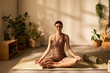 © pressmaster - Caucasian young adult woman sitting cross legged on yoga mat meditating with eyes closed in sunlit room, surrounded by green plants practicing mindfulness and relaxation