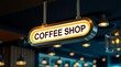 © Jittiwan - Sleek, pill-shaped, backlit signage with a brushed metal frame displaying the words 'COFFEE SHOP' suspend from a ceiling in a dimly lit cafe