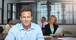 © peopleimages.com - Portrait, smile and business man in office for finance career, coworking and accounting. Confident, professional auditor and person in workplace for bookkeeping, investment development and about us