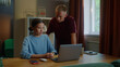 © Татьяна Епанешникова - Boss man checks scold asian woman subordinate do task incorrectly mistake fail report. Management dissatisfied work. Employee wrong answer, bug fixes, error correction. Bad job. Guy show laptop screen
