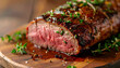 © hardvicore - Aged venison backstrap roast garnished with fresh herbs, rustic wooden board, delicious food, tasty