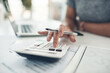 © Nicholas F/peopleimages.com - Finance planning, budget or savings manager calculating expenses, taxes or company profits with laptop, paperwork or calculator. Closeup hands of female financial leader checking office staff payroll
