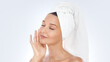 © Buyanskyy Production - Spa Skincare Woman With Towel Enjoying Fresh Clean Face Care Routine