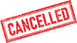 © Rubber Stamp - Distressed Red Canceled Rubber Stamp Impression with Rectangular Border on White Background
