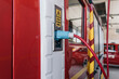 © Jorge - Electric firetruck charging at station, embracing sustainable future