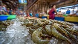 Fresh prawns and shrimp piled on crushed ice at a vibrant indoor seafood market stall, chilled display ready for shoppers seeking local, natural ingredients for cooking