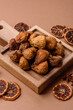 © chernikovatv - Dried fig are a sweet, healthy fruit for vegans and vegetarians. Dried fig as a food background