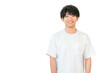 © buritora - Smiling Asian man in an oversized t-shirt