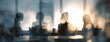 © Snowstudio - Business meeting silhouettes with blurred background and sunlight