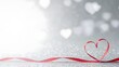 © Tania - A red ribbon heart on a sparkling background with white hearts