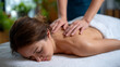 © Maksym Tereshchenko - Woman receiving cupping therapy on her back, traditional Chinese medicine treatment for pain relief and relaxation, hijama at spa salon concept, side angle showing massage table an