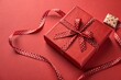 © Anastasiia Kasina - Red gift box on the red background. Copy space, top view