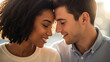 © ManuStockStudio - Happy multiracial couple smiling and embracing each other