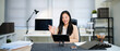 © Stella 16 - Freelance business women using tablet working call video conference with customer in workplace at office