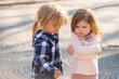 © Volodymyr - Kids bad behavior. Two toddler friends behavior. Preteen friends and behavior friendship concept. Mad angry girls sisters. Children with bad behavior arguing and dont want to be friends.