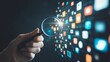 © nikomsolftwaer - Exploring digital insights a hand with a magnifying glass over social media icons virtual environment close-up view technology concept
