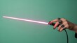 © Wool World - Surreal Hand Clutches Glowing Lightsaber With Pink Blade and Black Sleeve in Dynamic Teal-Backed Illustration