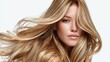 © Newleks - Young woman with natural skin tone holding an intense gaze, featuring her wavy blonde hair with highlights cascading around her face, embodying elegance, beauty, and hair health