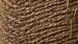 © Mrstef - A detailed closeup of tightly woven natural fibers showcases the intricate texture and earthy tones. The closeup reveals the complexity of the materials surface and structure.