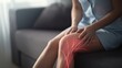 © Yatsy - The Woman's Knee Showing Sciatica Nerve Pain Highlighted by Red Digital Overlay