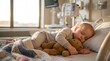 © Artem Zatsepilin - sick caucasian child sleeping in hospital bed hugging teddy bear. toddler patient resting during recovery. pediatrics healthcare concept. banner, website header.