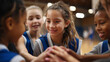 © Laura - Vertical image of teenage girls in sports team, children having fun in basketball program, youth female athletes, school athletic club, girls celebrating teamwork, young players