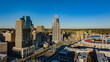 © AmazingAerialAgency - Aerial view of the towering Great American Tower and the Paycor Stadium, a vibrant contrast against the city's skyline, Cincinnati, Ohio, United States.
