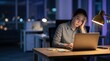 © Philipp - Exhausted woman working late on laptop at night, workplace burnout
