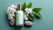 © rahit - Natural skincare bottle presented with smooth stones and delicate flowers on a green background, emphasizing purity and organic beauty.