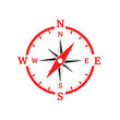 © Tania Dewi - Red compass navigation tool symbol.