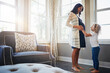 © BuyoutReese06/peopleimages.com - Pregnant woman, mother or child bonding with stomach in home for baby kick, connection or curious. Pregnancy, mom or excited boy with belly touch in house for prenatal support, movement and affection