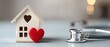 © setiadio - Wooden house with red heart and stethoscope healthcare concept