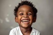© nsit0108 - Portrait of adorable african american toddler boy showing big smile and perfect healthy teeth