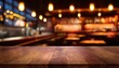 © Judith - Empty Dark Wooden Table Top On Blurred Bar Or Restaurant Background With Warm Lighting Banner With Copy Space Template Showcase Scene For Display Montage Advertising Product