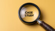 © Tetyana - Magnifying glass highlighting the words case study on a warm yellow background, representing thorough business investigation, detailed analysis, and dedicated research