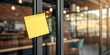 © itsumair - Yellow sticky note on glass wall symbolizing reminder, motivation, or business idea