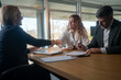 © Nenad - young couple shaking hands deal contract real estate investment