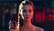 © Graphic Genius - Elegant beautiful woman with a braided hairstyle holds a black perfume bottle, looking at the camera with a confident expression under dramatic red cinematic lighting at night
