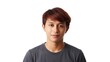 © Masaji - A friendly young Asian man with a gentle and confident smile looking directly forward.