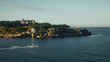 © Andre Silva - boat and headland in the sun in the north of spain