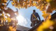 © sukarman - Professional Roofer Inspecting Gutter Under Autumn Sunlight with Safety Equipment