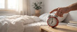 © Emanuel - Man Turning Off Red Alarm Clock in the Morning