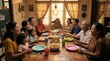 © revaldofadel - A Multi-Generational Family Gathers for a Joyful Meal Around a Dining Table, Sharing Food and Laughter