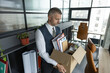 © be free - Resign and resignation. Change of job or fired from company resign. Losing his job. Jobless man unemployed. Career failure. Businessman leaving office holding box with office supplies