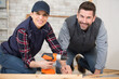 © auremar - man and woman working on a carpentry job