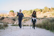 © Cristian Blázquez - Women nordic walking outdoors for fitness and active lifestyle