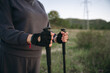 © Cristian Blázquez - Person doing nordic walking holding trekking poles