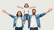 © Maureen - Happy family celebrating together with joyful expressions and open arms
