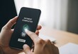 © mayur - Person confirming mobile payment on smartphone with payment completed message showing cashless transaction digital banking convenience and secure online purchase process
