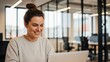 © Svyatoslav Lypynskyy - Woman Smiling Working Laptop Office